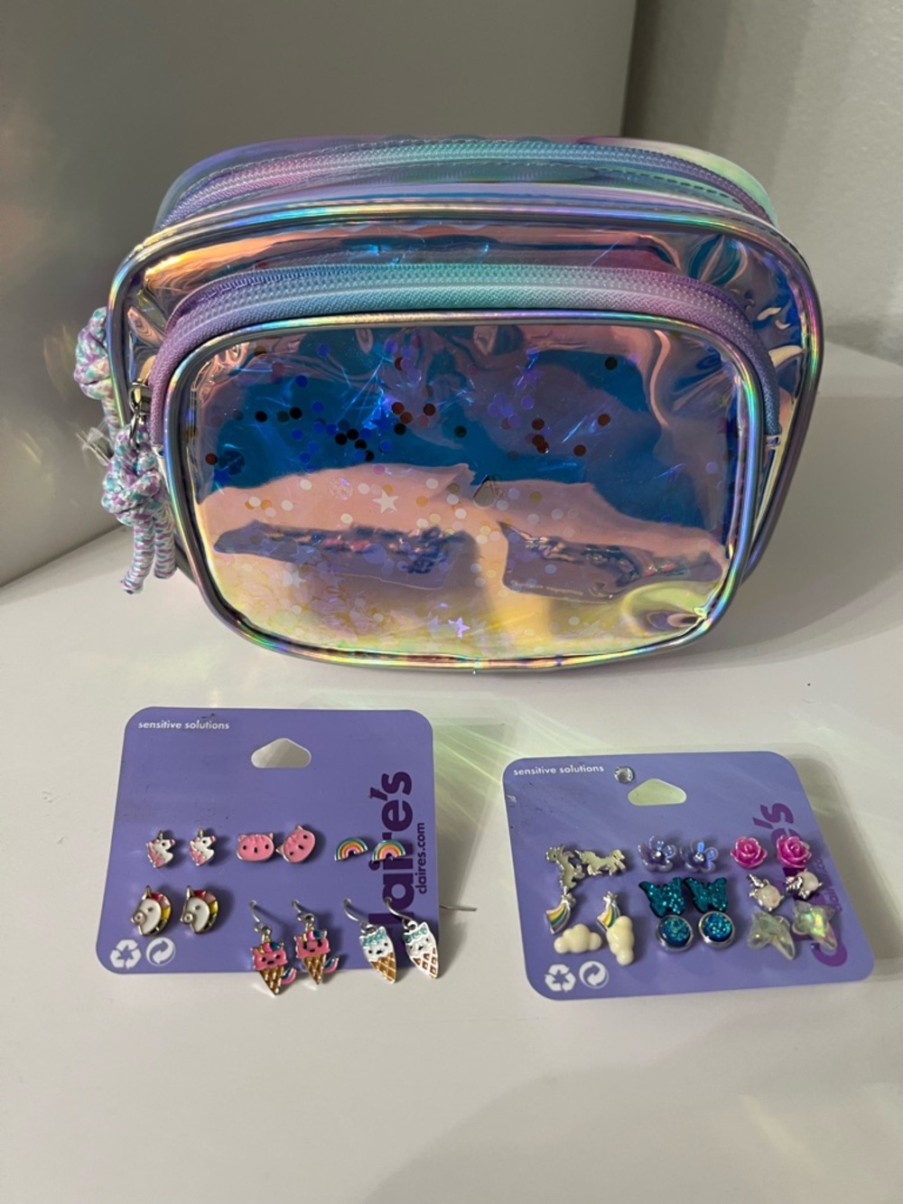 Holographic New Kids Fanny pack/ Bag - Iridescent Purple, Two sets of earrings.